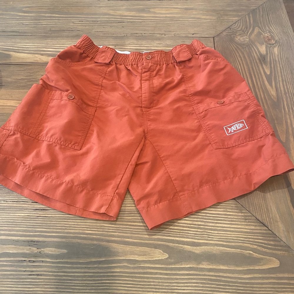 Men’s burnt orange Aftco shorts size 36.